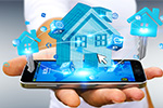 Smartphone mit Haus-Grafik darüber